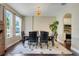 Stylish dining room featuring a modern light fixture and seamless access to the kitchen, perfect for entertaining at 10252 Kristen Park Dr, Orlando, FL 32832