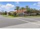 Entrance to the Stanton Estates neighborhood featuring mature landscaping and well-maintained streetscape at 108 Stanton Estates Cir, Winter Garden, FL 34787
