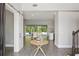 The light and airy foyer leads to an open floorplan with access to the dining room and living areas at 108 Stanton Estates Cir, Winter Garden, FL 34787
