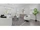 Inviting living room featuring stylish decor, modern furniture, and ample space for relaxation at 108 Stanton Estates Cir, Winter Garden, FL 34787