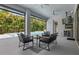 An outdoor seating area with a ceiling fan and a view of the pool at 108 Stanton Estates Cir, Winter Garden, FL 34787