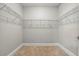 A walk-in closet with carpet and wire shelving at 108 Stanton Estates Cir, Winter Garden, FL 34787