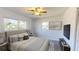 Comfortable bedroom featuring hardwood flooring, natural light, and a contemporary design at 1119 Edith Dr, Daytona Beach, FL 32117