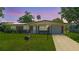Charming brick home with well-maintained lawn and inviting curb appeal at 1119 Edith Dr, Daytona Beach, FL 32117