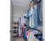Walk-in closet with shelving and hanging space, providing organized storage solutions for clothing and accessories at 12020 Philbrook Ct, Orlando, FL 32825