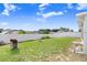 Large backyard with a well-maintained lawn and white fence at 125 Vervain Ave, Davenport, FL 33837