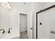 Modern bathroom with glass-enclosed shower, white subway tile, and sleek vanity with modern fixtures at 13175 Telsen St # 40, Winter Garden, FL 34787
