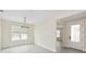Bright dining room boasting stylish lighting, updated flooring, and an open layout perfect for entertaining at 13175 Telsen St # 40, Winter Garden, FL 34787