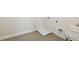 Convenient laundry room featuring neutral tile flooring, utility sink and connections for washer/dryer at 13175 Telsen St # 40, Winter Garden, FL 34787