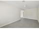 Spacious room featuring a ceiling fan and tile flooring, offering a blank canvas for personal design touches at 13175 Telsen St # 40, Winter Garden, FL 34787