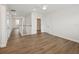 Large loft space with hardwood floors, abundant natural light, and access to bedrooms at 13175 Telsen St # 40, Winter Garden, FL 34787