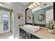Bathroom features a vessel sink, granite countertop and decorative light fixture at 1390 Yellow Pine Ct, Winter Springs, FL 32708