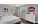Bedroom with a window, dresser, and shelving at 1390 Yellow Pine Ct, Winter Springs, FL 32708