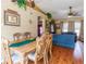 Dining room view highlighting elegant dining set, decor and adjacent living space at 1395 Deland Ave, Orange City, FL 32763
