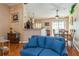 Spacious living area with an open floor plan leading to the dining and kitchen areas at 1395 Deland Ave, Orange City, FL 32763