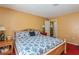 Inviting main bedroom offering a relaxing ambiance and connecting bath at 1395 Deland Ave, Orange City, FL 32763