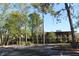 Contemporary building surrounded by lush trees, offering a blend of nature and modern architecture at 149 E Plantation Blvd, Lake Mary, FL 32746