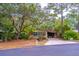 Charming single-story home featuring a well-maintained front yard with mature trees and a long driveway at 149 E Plantation Blvd, Lake Mary, FL 32746