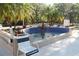 Outdoor spa fountain surrounded by tropical plants and flowers where residents can relax and enjoy the spa at 149 E Plantation Blvd, Lake Mary, FL 32746