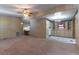 Spacious living room with view of the kitchen and connected dining room at 149 E Plantation Blvd, Lake Mary, FL 32746