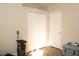 Bright bedroom featuring a closet, an entry door, and a neutral color scheme at 149 Southampton Dr, Kissimmee, FL 34744