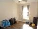 Bedroom with ceiling fan, natural light, and lots of empty space at 149 Southampton Dr, Kissimmee, FL 34744