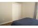 Bedroom with a comfortable bed, a closet, and soft gray curtains at 149 Southampton Dr, Kissimmee, FL 34744