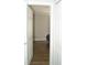View into a bedroom from a doorway featuring wood floors and neutral paint at 149 Southampton Dr, Kissimmee, FL 34744