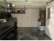 Garage with epoxy floor and storage shelves at 149 Southampton Dr, Kissimmee, FL 34744