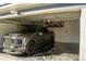 Garage featuring epoxy floors, storage and vehicle at 149 Southampton Dr, Kissimmee, FL 34744