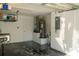 Epoxy garage floor with new water heater and storage at 149 Southampton Dr, Kissimmee, FL 34744