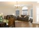 Comfortable living room and dining area with ample seating and stylish decor at 149 Southampton Dr, Kissimmee, FL 34744