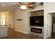 Open-concept living area with fireplace and high ceilings at 149 Southampton Dr, Kissimmee, FL 34744