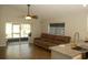 Relaxing living room featuring granite counters and sliding glass doors at 149 Southampton Dr, Kissimmee, FL 34744