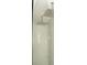 Modern shower with dual rainfall showerheads and marble-like tile at 149 Southampton Dr, Kissimmee, FL 34744