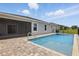 Backyard oasis with a stunning private pool perfect for outdoor entertainment and relaxation at 15250 Aquarius Way, Mascotte, FL 34753
