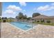 Backyard features a private pool with fenced in yard perfect for relaxation and recreation at 15250 Aquarius Way, Mascotte, FL 34753