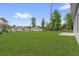 Expansive backyard with lush green lawn and ample space for outdoor activities at 15443 Sw 21St Ct, Ocala, FL 34473