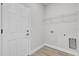 Practical laundry room with utility connections and shelving at 15443 Sw 21St Ct, Ocala, FL 34473