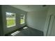 Bright bedroom with two windows offering an abundance of natural light at 16367 Sw 17Th Terrace Rd, Ocala, FL 34473