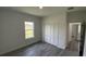 Minimalist bedroom with a window and closet space at 16367 Sw 17Th Terrace Rd, Ocala, FL 34473