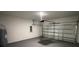 Spacious two car garage ready for your vehicles with a new epoxy floor and paint at 16367 Sw 17Th Terrace Rd, Ocala, FL 34473