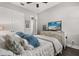 Relaxing bedroom with soft bedding, a TV, and modern decor providing a comfortable retreat at 16761 Broadwater Ave, Winter Garden, FL 34787