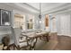 Bright dining room featuring stylish decor, hardwood floors and ample natural light at 16761 Broadwater Ave, Winter Garden, FL 34787