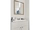 Bathroom featuring a white vanity with new faucet fixtures and modern mirror at 1705 Virginia Dr, Orlando, FL 32803