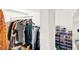 Walk-in closet featuring clothing racks and shoe organizers at 1705 Virginia Dr, Orlando, FL 32803