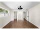 Bright bedroom with wood floors, closet, and doorways at 17524 Seidner Rd, Winter Garden, FL 34787
