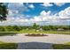 Picturesque circular driveway with landscaping, offering a glimpse of the beautiful surroundings and home at 17524 Seidner Rd, Winter Garden, FL 34787