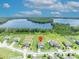 Beautiful home with lake view and expansive lawn; perfect for outdoor activities at 17537 Sailfin Dr, Orlando, FL 32820