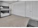 Large bedroom with bunk beds, neutral carpet, and ample space for creative design at 17537 Sailfin Dr, Orlando, FL 32820